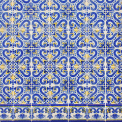 Traditional portuguese tiles azulejo, Blue and yellow azulejos on the building's exterior in Lisbon, Portugal - 179517862