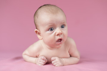 Cute happy baby girl crawling 