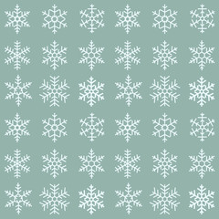 Seamless simple pattern of different blue geometric snowflakes