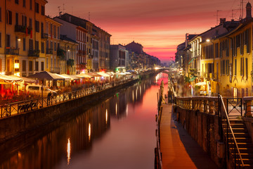 Bridge across the Naviglio Grande canal at sunset, Milan, Lombardia, Italy