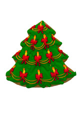 Christmas gingerbread cookie made in shape of Christmas tree isolated on white background