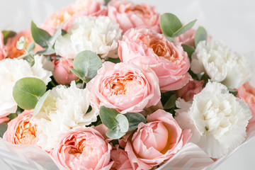 Bouquet of mixed flowers in glass vase. close-up