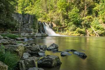 Green Waterfalls with Rocks 