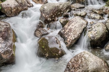Nature in High Tatras in Slovakia. Mountains of rocky rocks cliffs and waterfalls suitable as background pictures of wishes, banners.