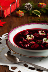 Traditional, Polish Christmas red borsch with dumplings.