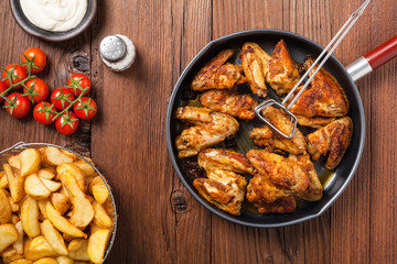 Baked wings, served with dip or baked potatoes.