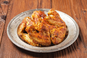 Baked wings, served with dip or baked potatoes.