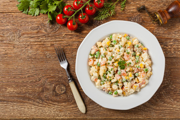 Traditional salad with cooked vegetables with mayonnaise.