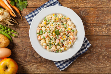 Traditional salad with cooked vegetables with mayonnaise.