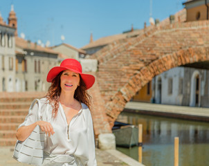 Beautiful tourist shopping in Italian village