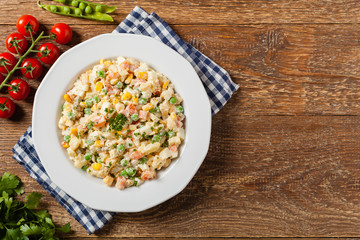 Traditional salad with cooked vegetables with mayonnaise.