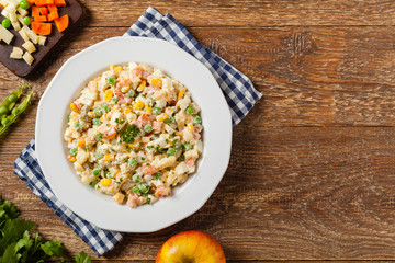 Traditional salad with cooked vegetables with mayonnaise.