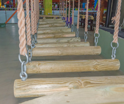 indoors , the logs on the ropes as an obstacle in the adventure Park