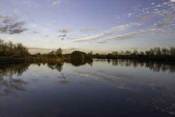 Fototapeta premium Sunset over Ryder's Mere, West Midlands, England