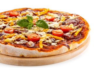 Pizza pepperoni with tomatoes, salami and pepper