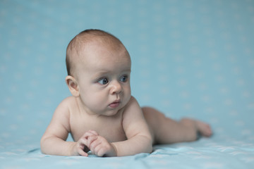 Baby lying on belly