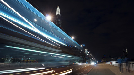 Fototapeta na wymiar Traffic cars on London Bridge with The Shard in background, LONDON, ENGLAND, long exposure