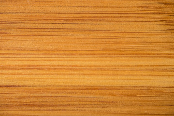 Naklejka premium Fragment of board made of bamboo. Wooden background.