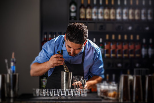 Bartender preparing an alcoholic beverage