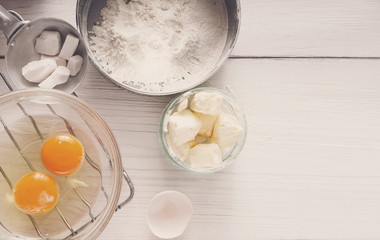 Fototapeta na wymiar Baking ingredients on white background, copy space