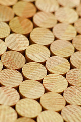 Wooden round beams, round logs, building material for the construction of a wooden house, log cabin.