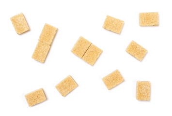 Brown cane sugar cubes isolated on white background, top view