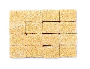 Brown cane sugar cubes isolated on white background, top view