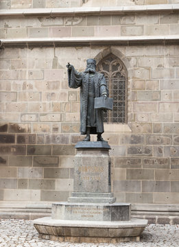 The statue of Honterus, who lived in 1498-1549, standing near the Black Church in the Brasov city in Romania