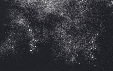 Baking concept on black background, sprinkled flour with copy space