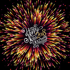 Happy New Year 2018. Christmas. Hand calligraphy. Dark background. Golden explosion of fireworks. Shimmering chaotic pieces of salute. Winter holidays. Greeting cards, banners, invitations.