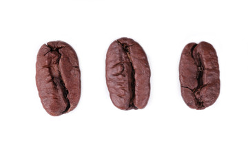  cracked grains of black fried coffee