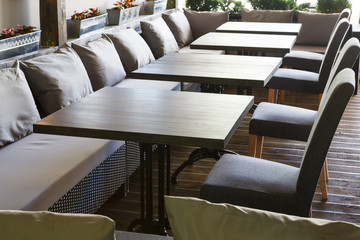 Cozy wooden interior of restaurant, copy space