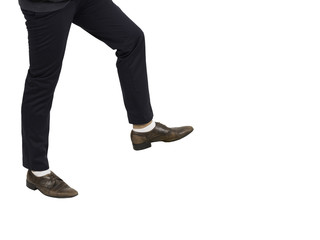 Part of man legs walking pose, isolated.  Man with blue pant, brown shoes walking forward pose