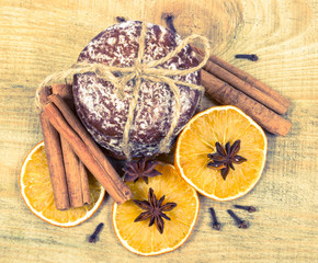Gingerbread cookies, cinnamon and orange slices. Christmas decoration.