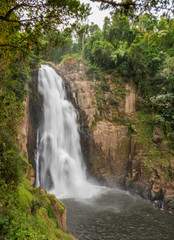 Fototapeta premium Beautiful huge Waterfall in Tropical forest, Thailand