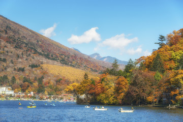 Fishing boats on Chuzenji lake. Autumn foliage, Nikko, Tochigi Prefecture, Japan