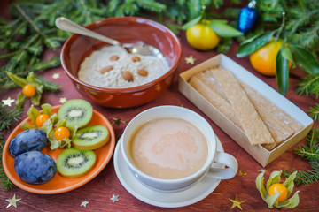 New Year's breakfast, coffee, bread, jam. Festive table setting.