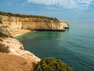 Fototapeta na wymiar Cliffs and sand beaches near Benagil