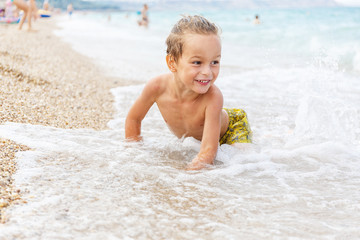 Beautiful boy and the sea