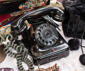 black vintage disk phone, for sale at the flea market