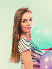 Woman summer joyful girl with colorful balloons