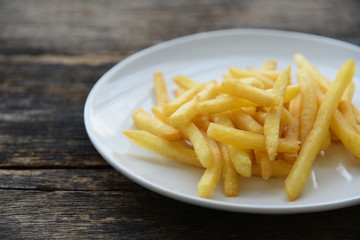 French fries on white dish
