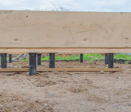 bottom view, on pile foundations hewn timber framing house