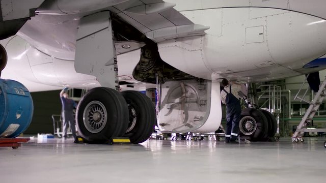 Airplane landing gear wheel. Repair brake of aircraft. Checking aircraft's tire