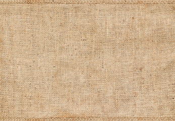 Background and texture of natural brown Sackcloth with Stitches Seam.