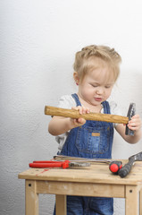 girl playing with tools - 179556011