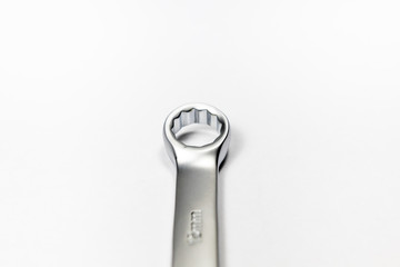 Steel wrench coated  with chrome with white background