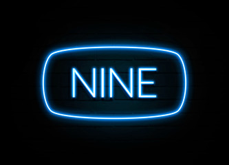 Nine  - colorful Neon Sign on brickwall