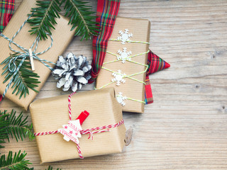 Christmas presents on wooden background, retro style with copy space