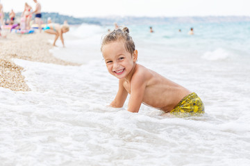 Beautiful boy and the sea